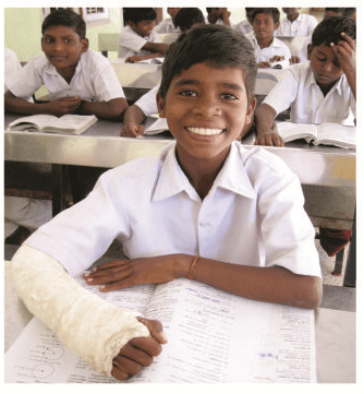 Iyyanar with his broken arm and a wide smile